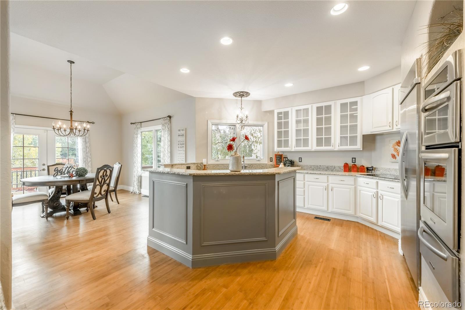 10734 Cougar Ridge Lone Tree, CO 80124 - Photo 8 of 35 a kitchen with counter top space and appliances