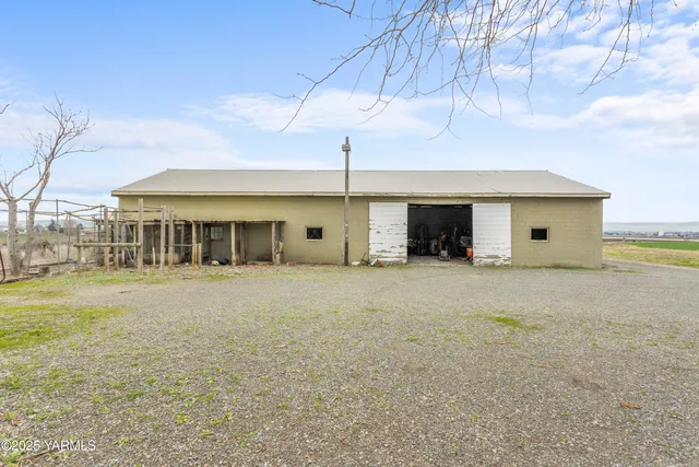 a view of parking garage with cars