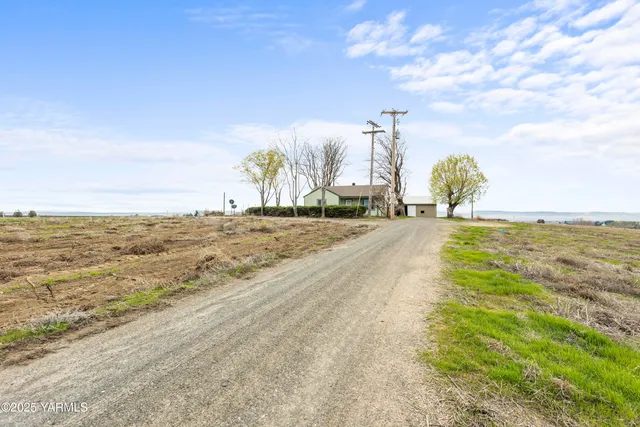 a view of a lake with a big yard
