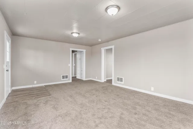 an empty room with an entryway