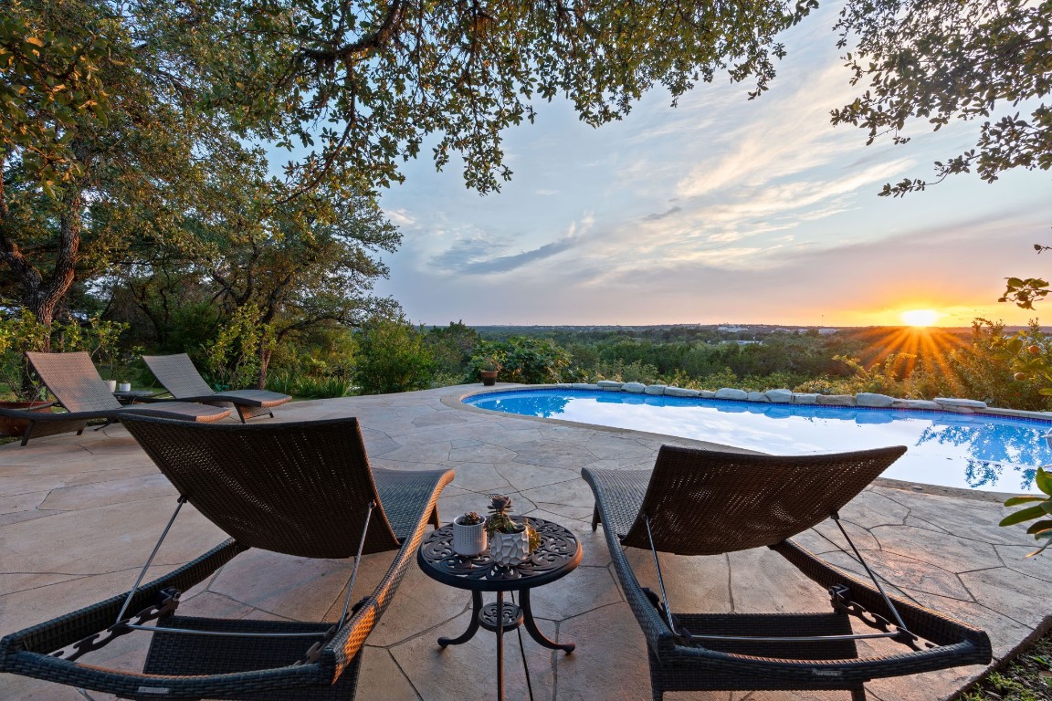 8800 Feather Hill Road Austin, TX 78737 - Photo 1 of 1 a view of a swimming pool with lounge chair
