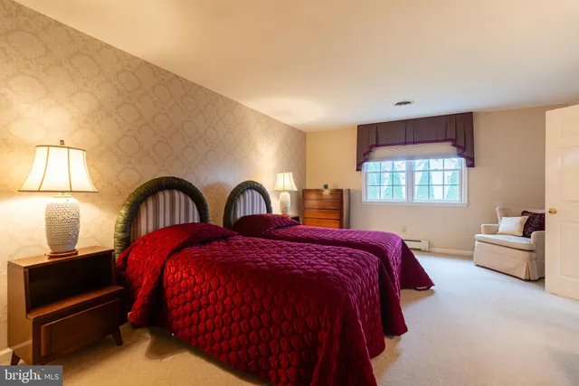 a bathroom with a tub and shower