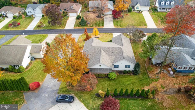 view of a brick house with a outdoor space