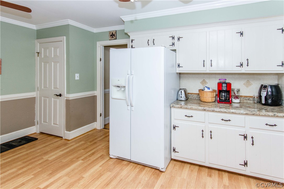 9818 Kendrick Road North Chesterfield, VA 23236 - Photo 14 of 36 a kitchen with stainless steel appliances a refrigerator and cabinets