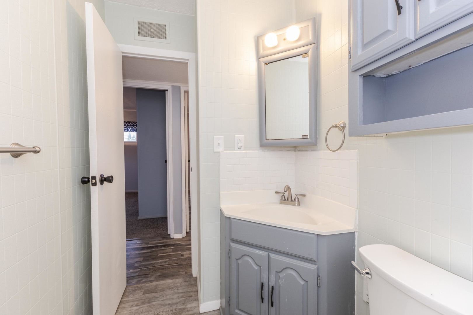 334 East Baker Street Bloomington, IL 61701 - Photo 24 of 32 a bathroom with a sink and a toilet