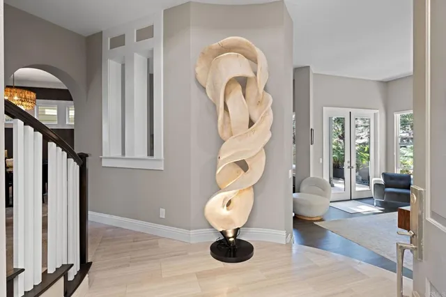 a view of living room with furniture and a window