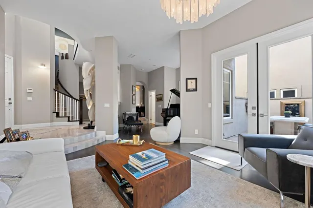 a living room with furniture and a rug