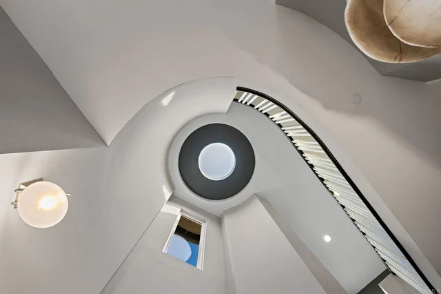 a utility room with sink dryer and washer