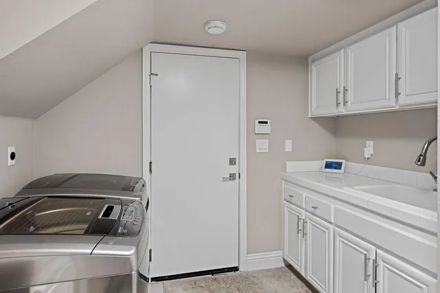 a view of a building with a yard