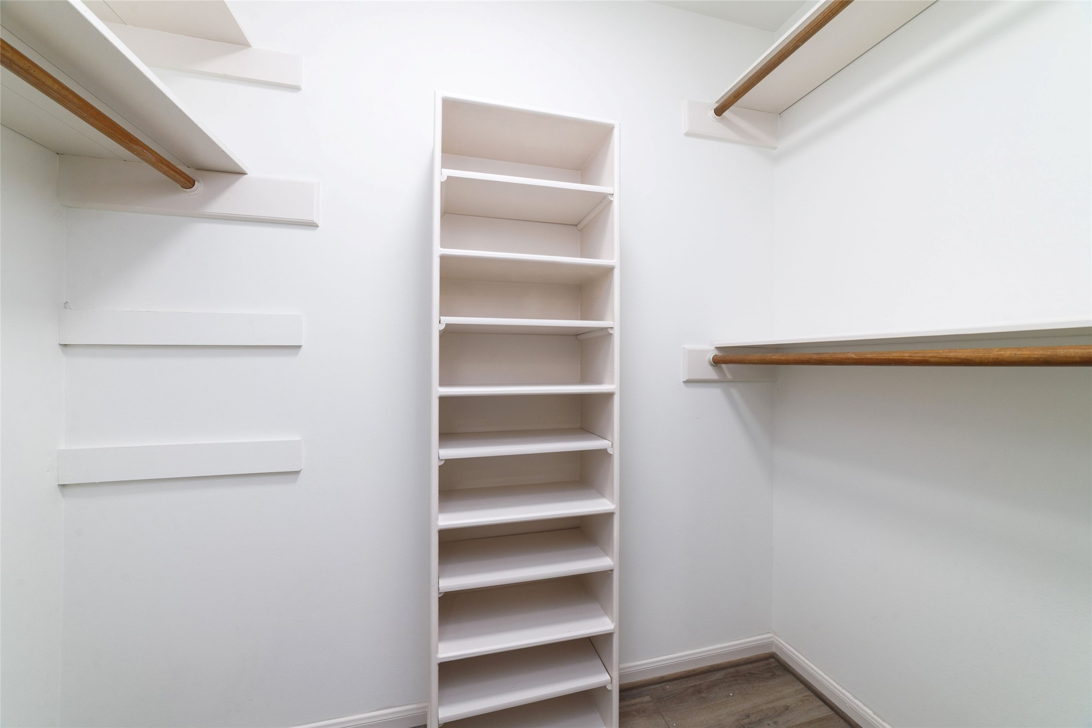 154 Old Bridge Lake Street Houston, TX 77069 - Photo 30 of 30 a view of walk in closet with empty racks