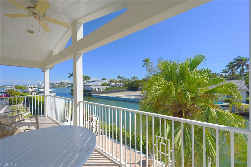 660 14th Avenue South Naples, FL 34102 - Photo 38 of 50 a view of a balcony with furniture