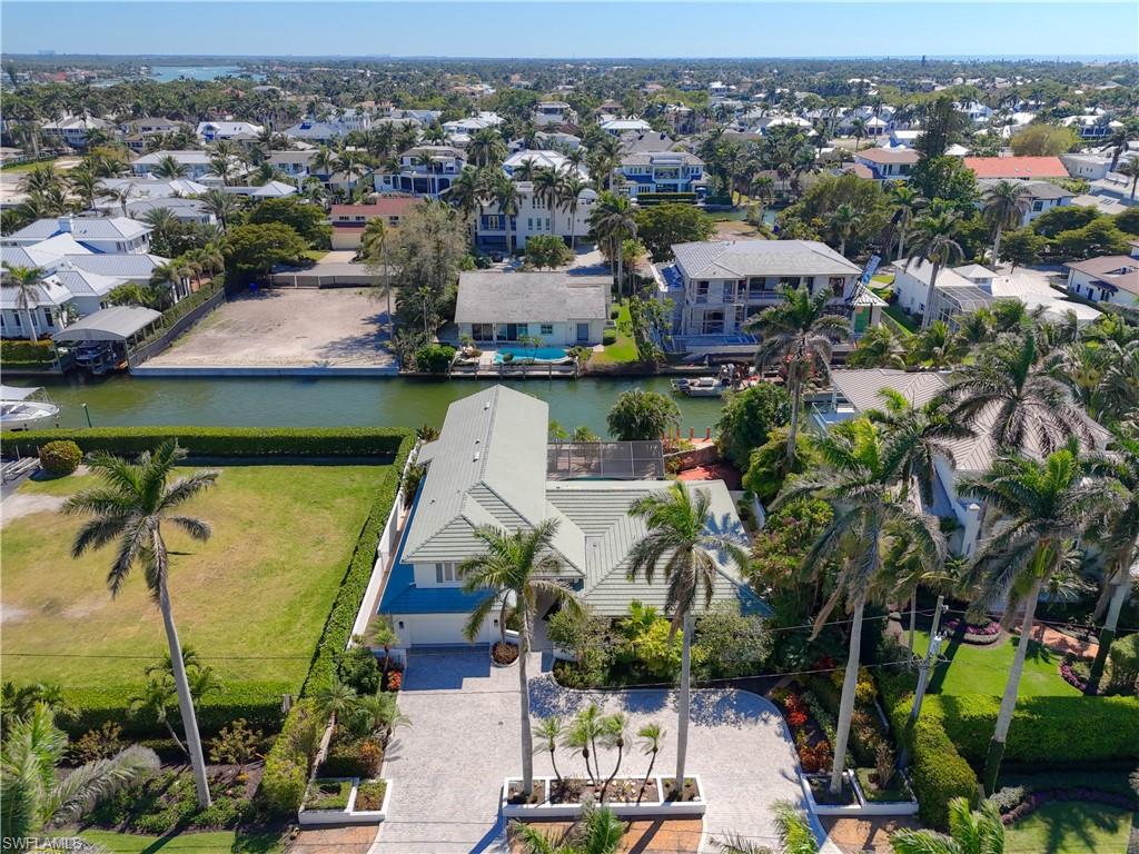 660 14th Avenue South Naples, FL 34102 - Photo 48 of 50 an aerial view of residential houses with outdoor space
