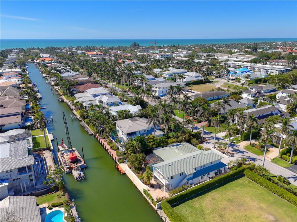 660 14th Avenue South Naples, FL 34102 - Photo 49 of 50 an aerial view of a house with a ocean view