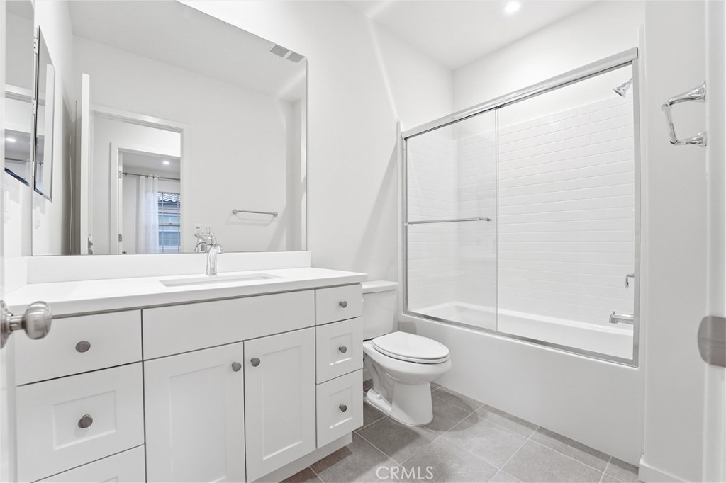 125 Messenger Irvine, CA 92618 - Photo 16 of 19 a bathroom with a sink a toilet and shower