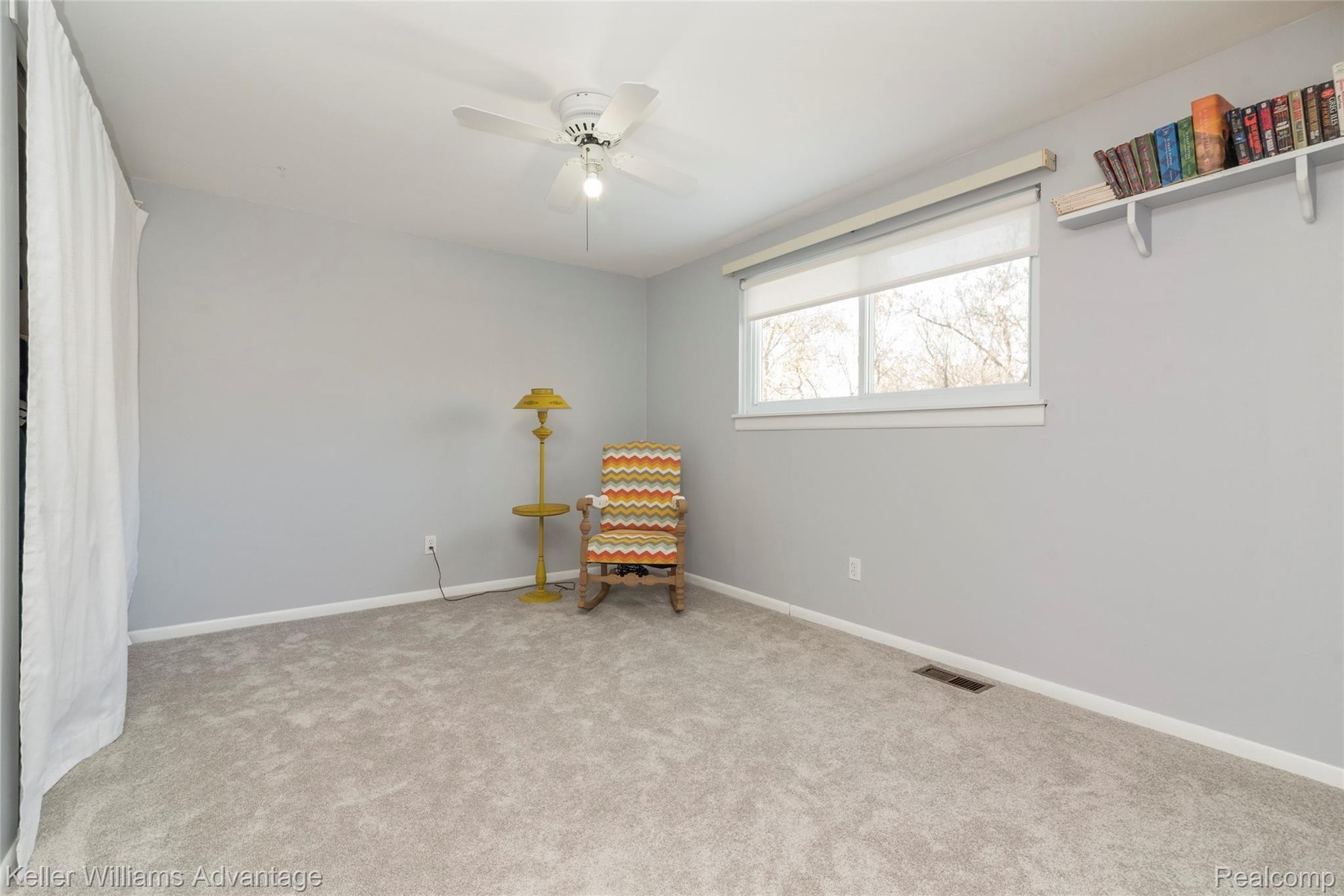 23049 Tuck Road Farmington, MI 48336 - Photo 15 of 21 Bedroom #2 (13x11) has wood floors under the carpet.