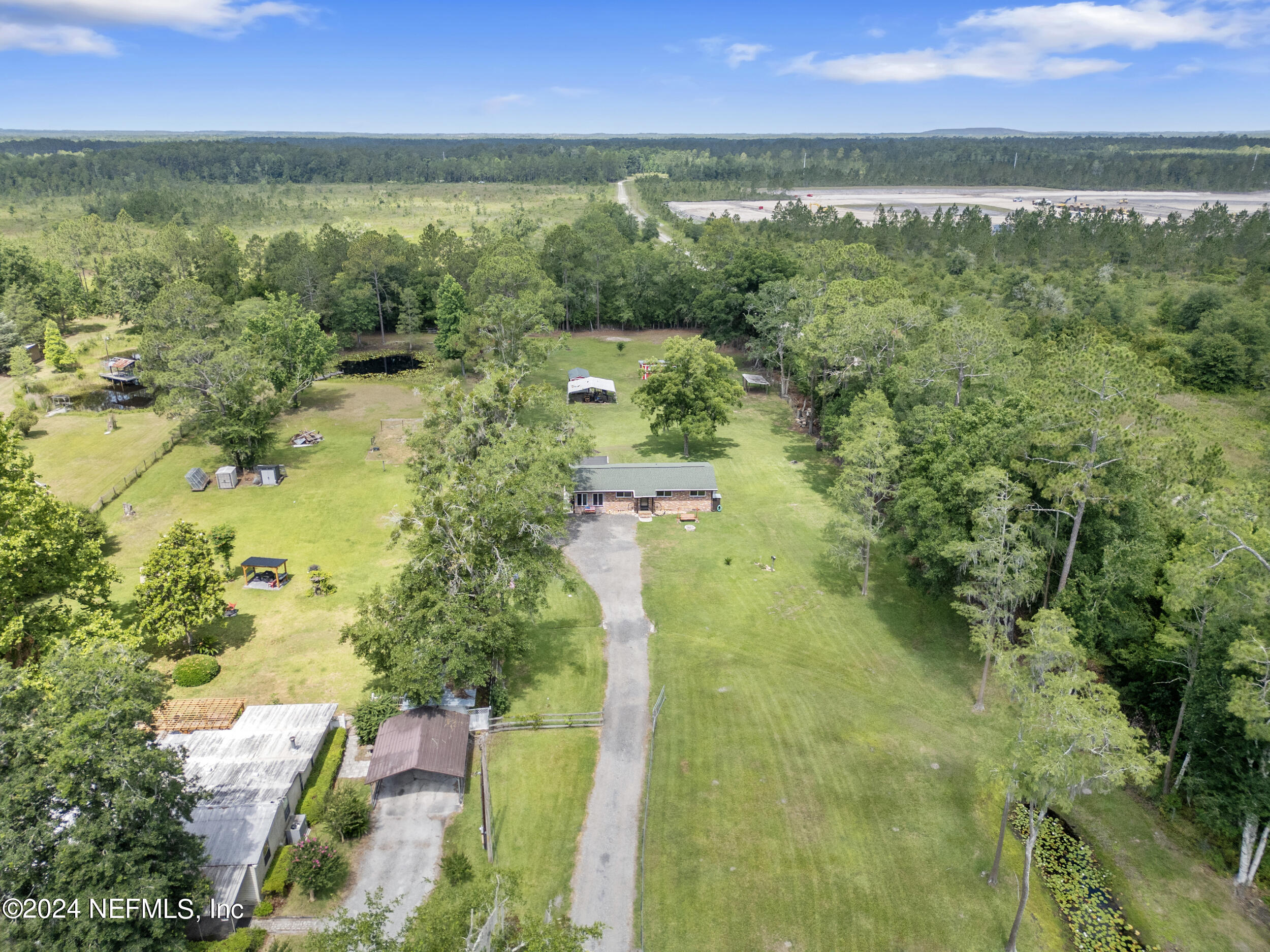 8912 McClelland Road Jacksonville, FL 32234 - Photo 42 of 49 a view of a lake with a city
