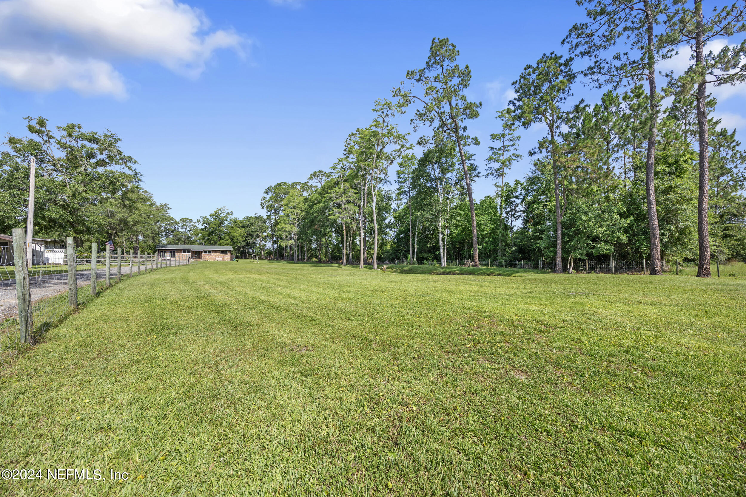 8912 McClelland Road Jacksonville, FL 32234 - Photo 9 of 49 a view of a park with large trees