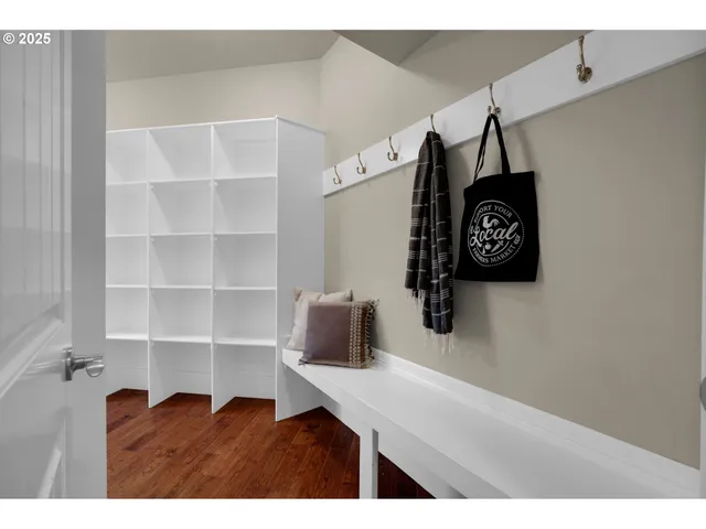 a kitchen with a refrigerator and a sink