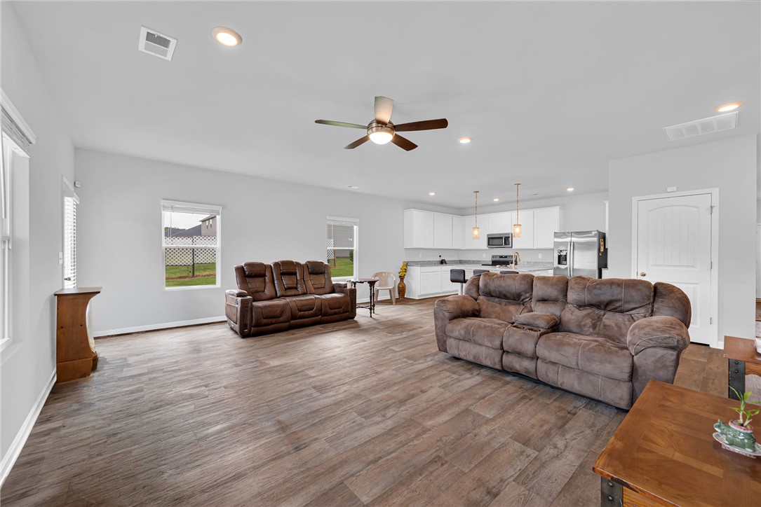 300 Clinkscales Road Anderson, SC 29624 - Photo 6 of 40 A spacious, naturally illuminated great room offers seamless transitions and ample gathering space.
