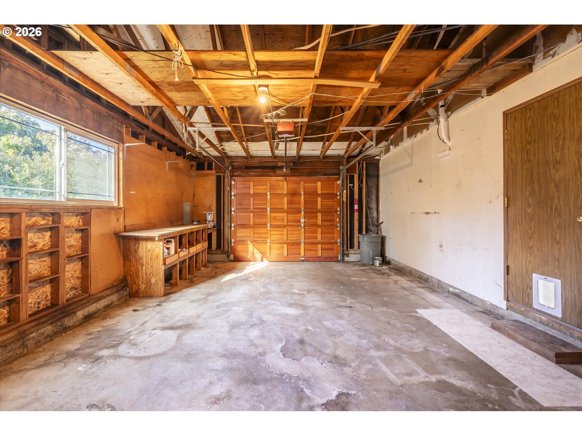 950 1st Street Northeast Bandon, OR 97411 - Photo 19 of 45 a view of a indoor garage