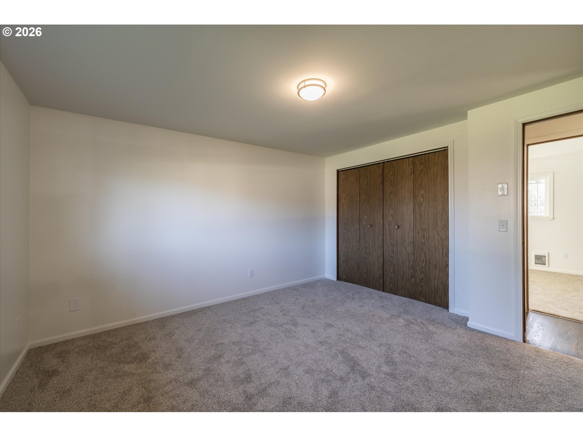 950 1st Street Northeast Bandon, OR 97411 - Photo 27 of 45 a view of an empty room