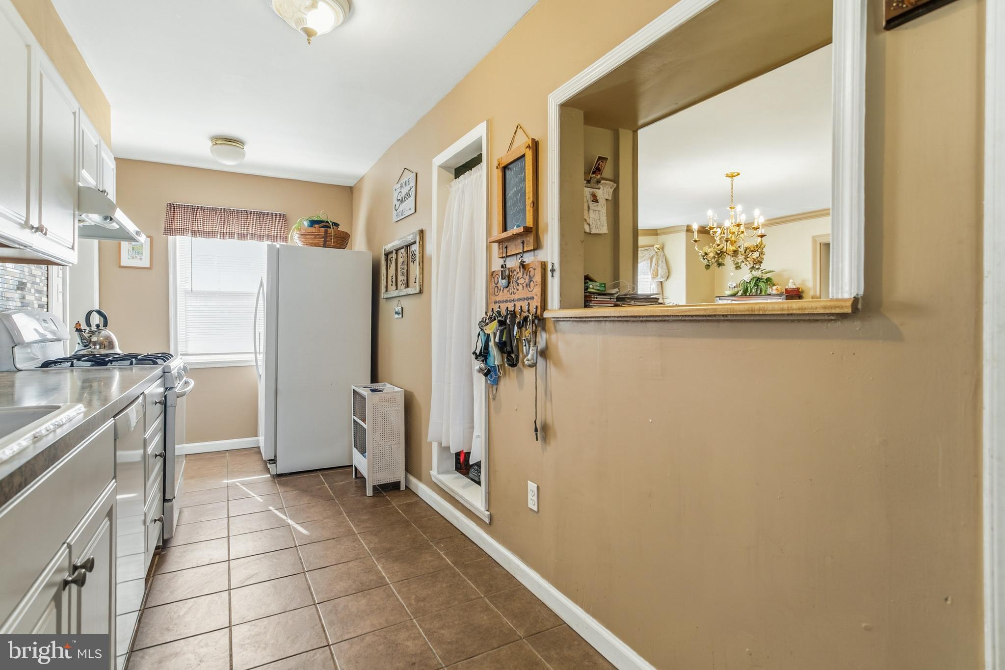 341 Owen Avenue Lansdowne, PA 19050 - Photo 19 of 58 a spacious bathroom with a granite countertop shower a sink and a mirror