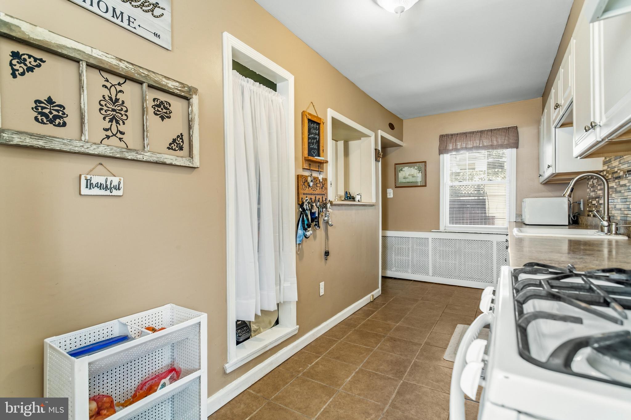 341 Owen Avenue Lansdowne, PA 19050 - Photo 20 of 58 a bathroom with a sink a toilet and shower