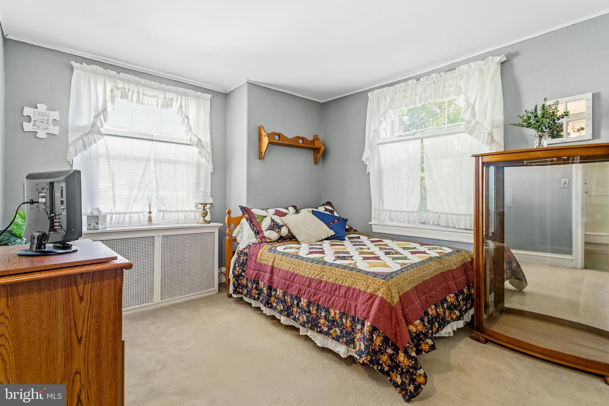 341 Owen Avenue Lansdowne, PA 19050 - Photo 26 of 58 a bedroom with a bed and a table