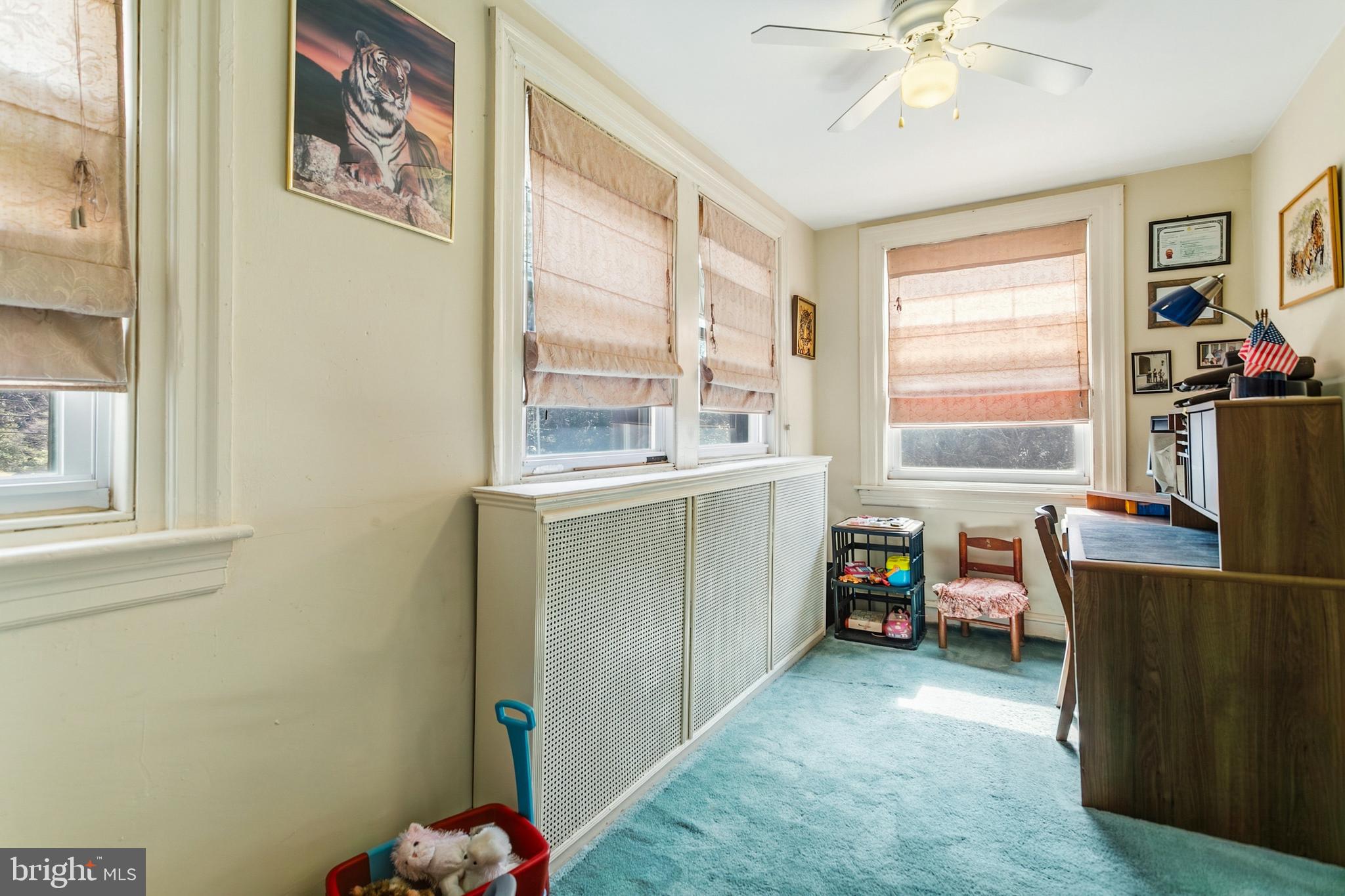 341 Owen Avenue Lansdowne, PA 19050 - Photo 28 of 58 a view of a workspace with furniture and a window