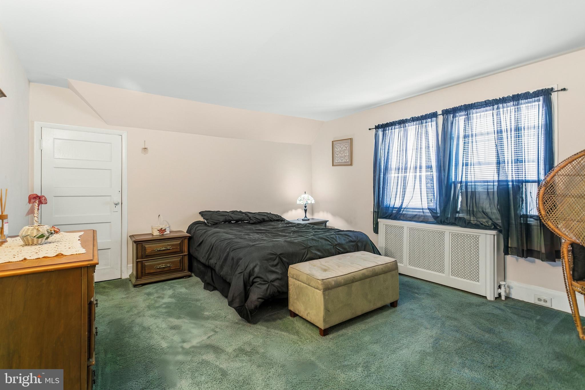 341 Owen Avenue Lansdowne, PA 19050 - Photo 30 of 58 a bedroom with a bed and a walk in closet