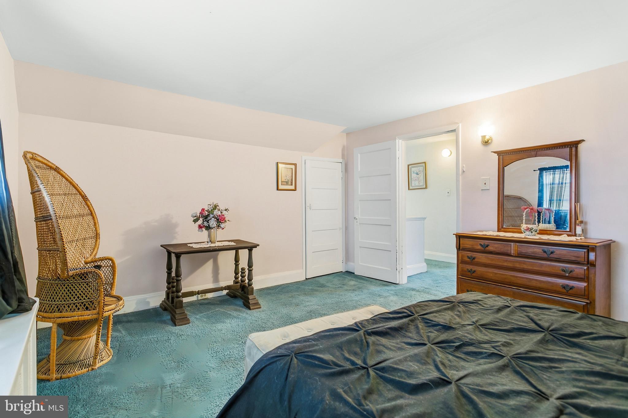 341 Owen Avenue Lansdowne, PA 19050 - Photo 31 of 58 a bed room with a bed and a chair