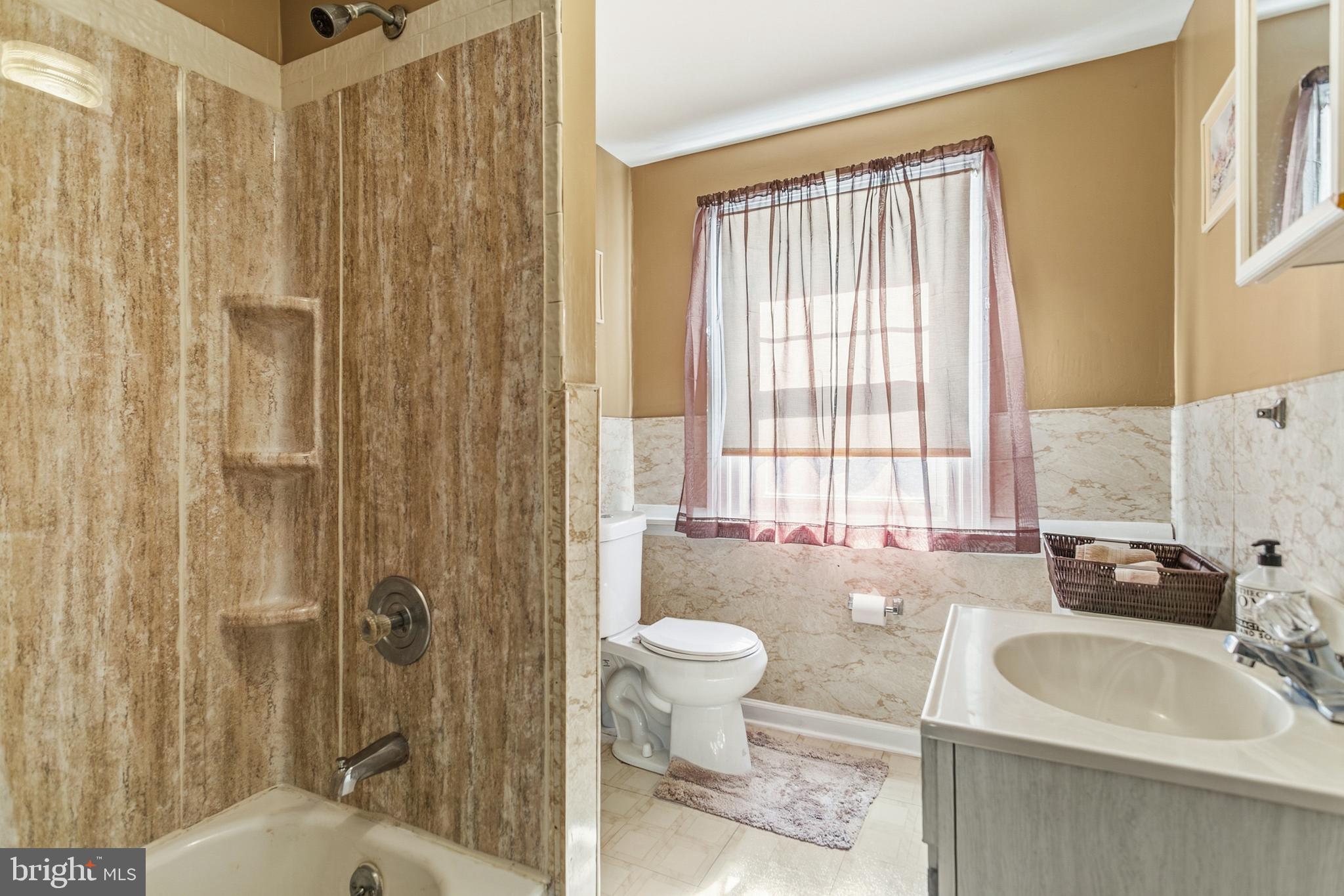 341 Owen Avenue Lansdowne, PA 19050 - Photo 35 of 58 a bathroom with a sink toilet and shower