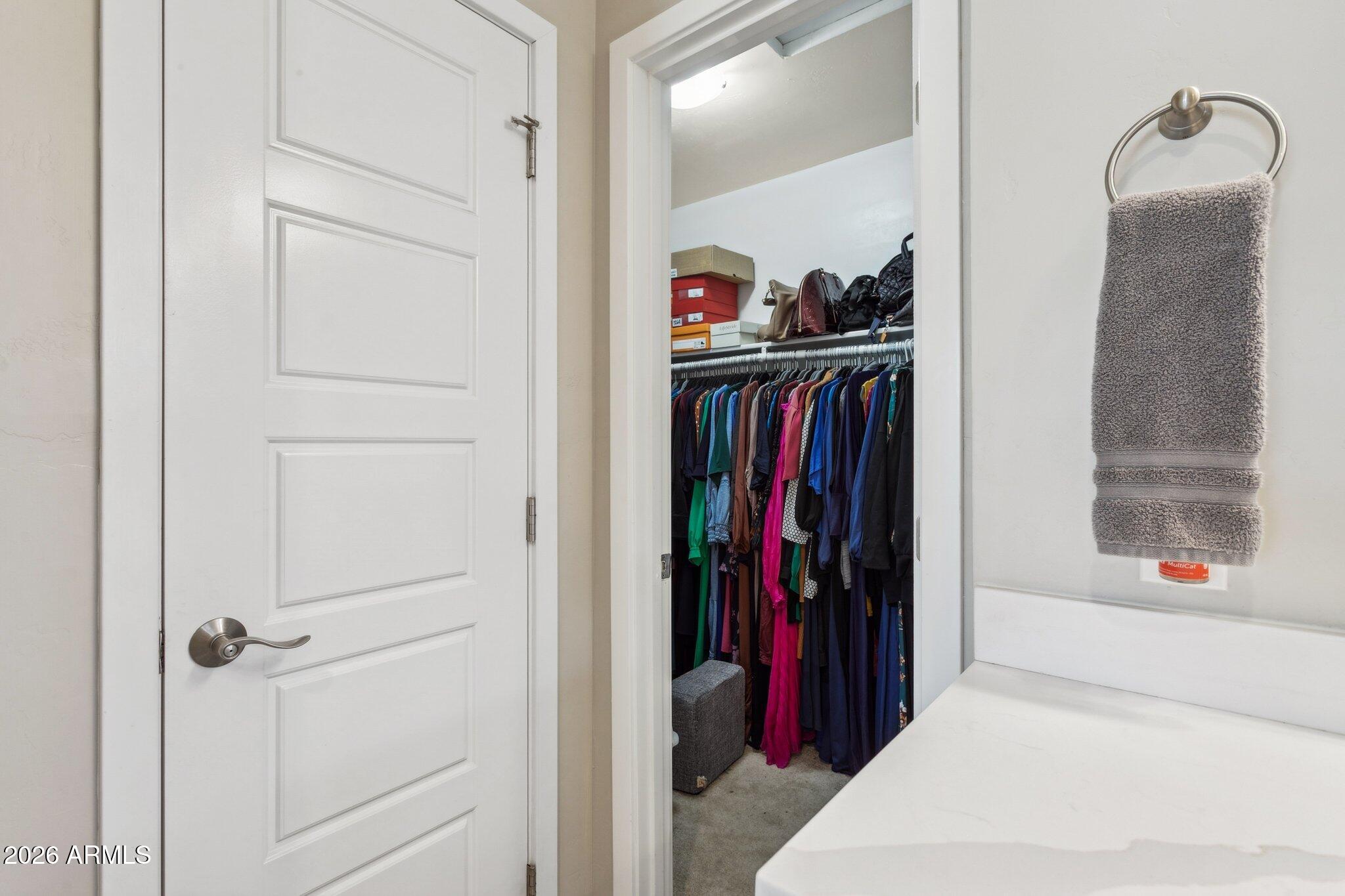 322 West Coronado Road Phoenix, AZ 85003 - Photo 61 of 93 a view of walk in closet with clothes and shoes