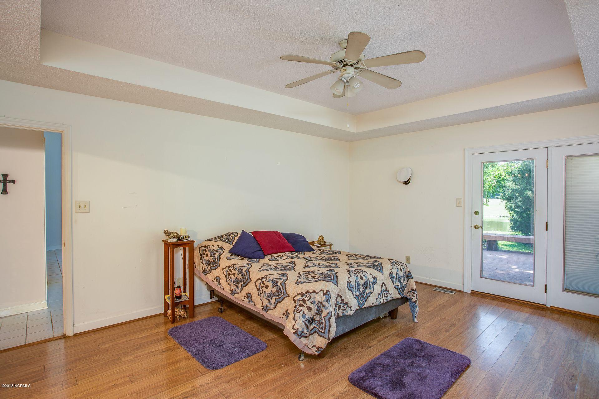 608 Sawgrass Road Hampstead, NC 28443 - Photo 23 of 32 Master Bedroom