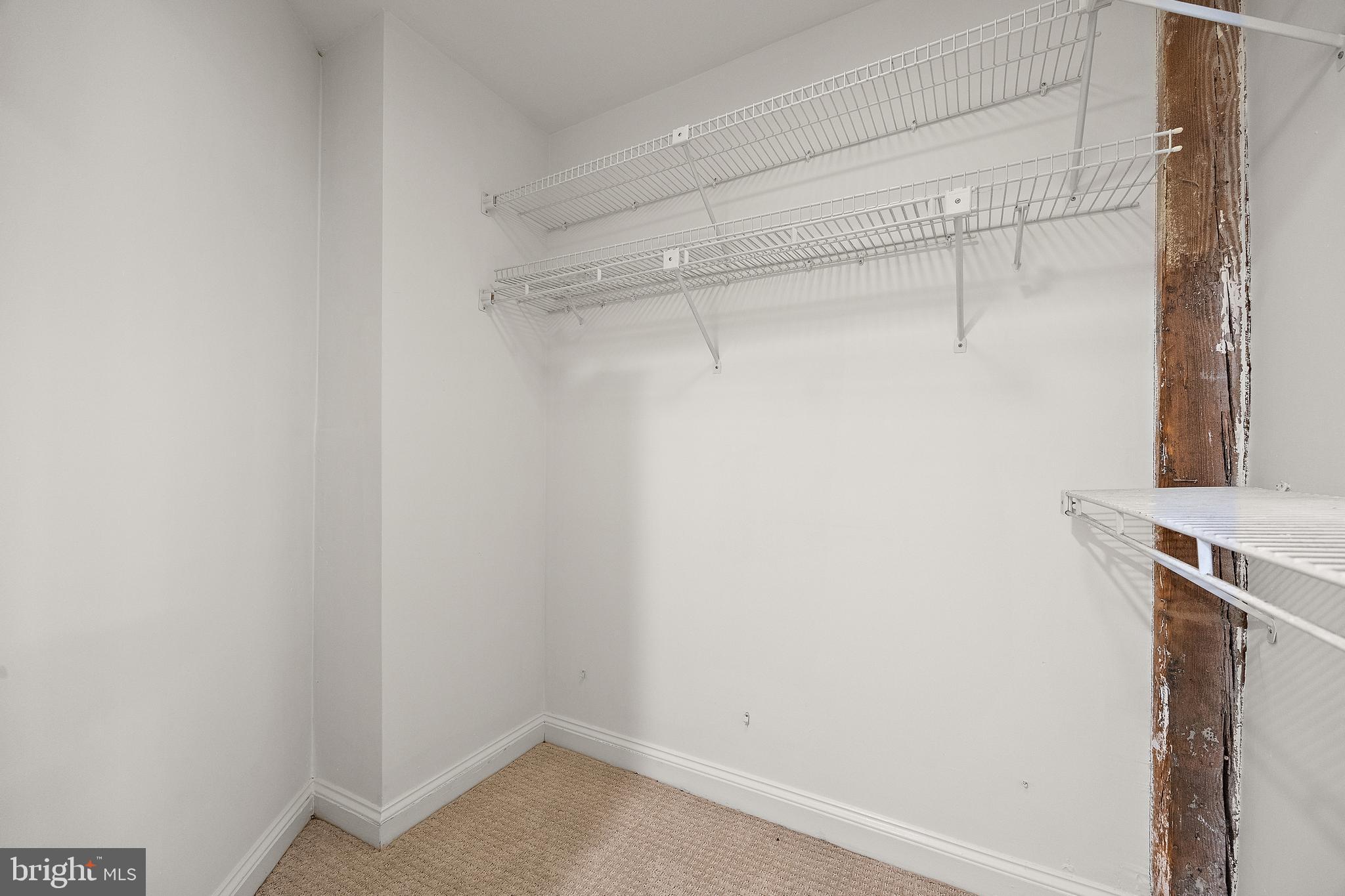49 Bancroft Mills Road, Unit 2I Wilmington, DE 19806 - Photo 21 of 27 a view of a walk in closet
