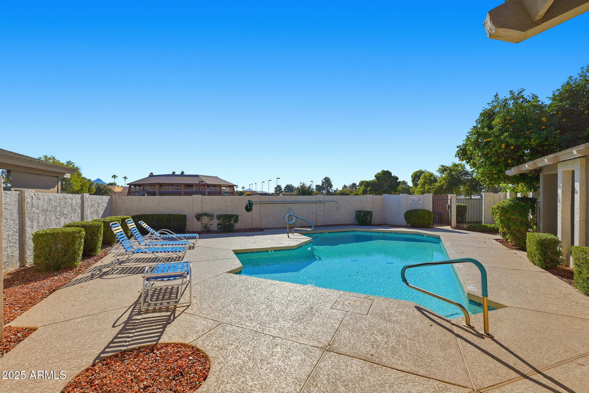 18002 North 12th Street, Unit 26 Phoenix, AZ 85022 - Photo 22 of 25 a view of a patio with swimming pool