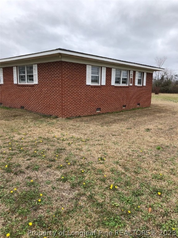 199 Herring Road Orrum, NC 28369 - Photo 3 of 20 a house with a outdoor space