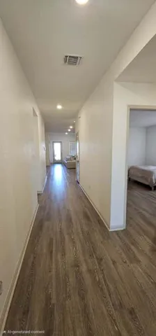 a view of gallery with wooden floor