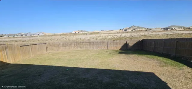 a view of outdoor space and yard