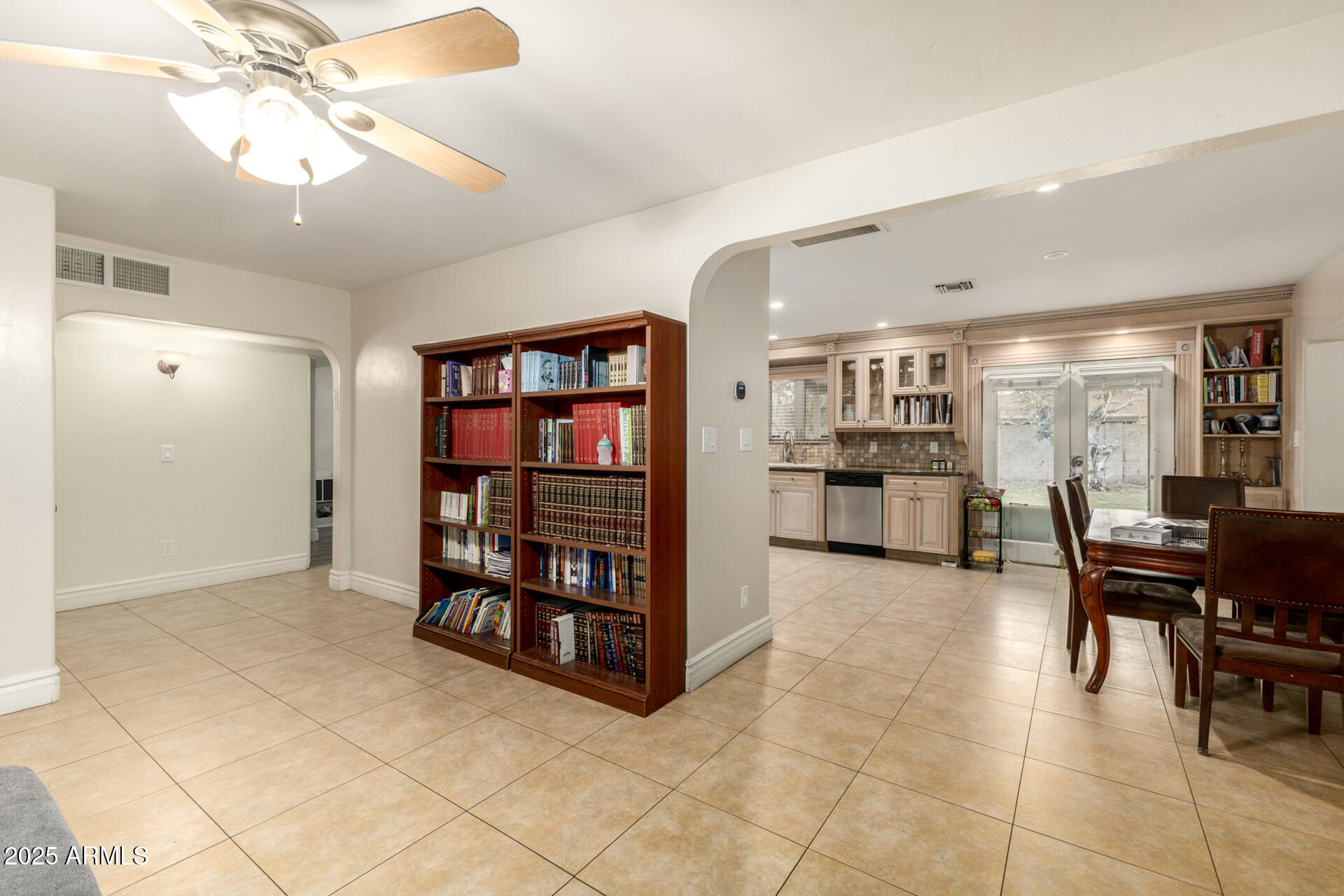 6842 North 10th Place Phoenix, AZ 85014 - Photo 11 of 60 a view of a workspace with furniture and a kitchen