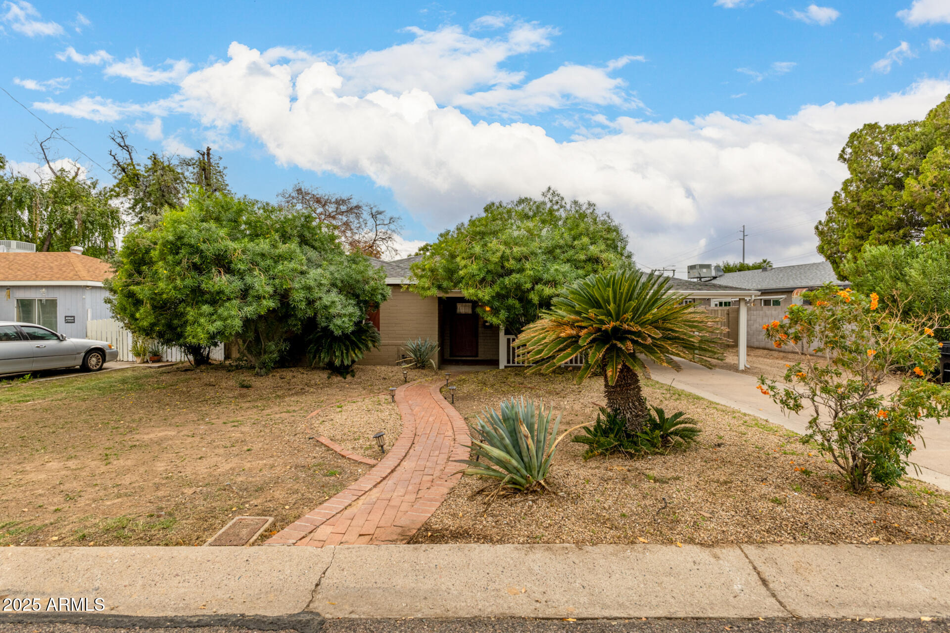 6842 North 10th Place Phoenix, AZ 85014 - Photo 4 of 60 a view of a house with entertaining space