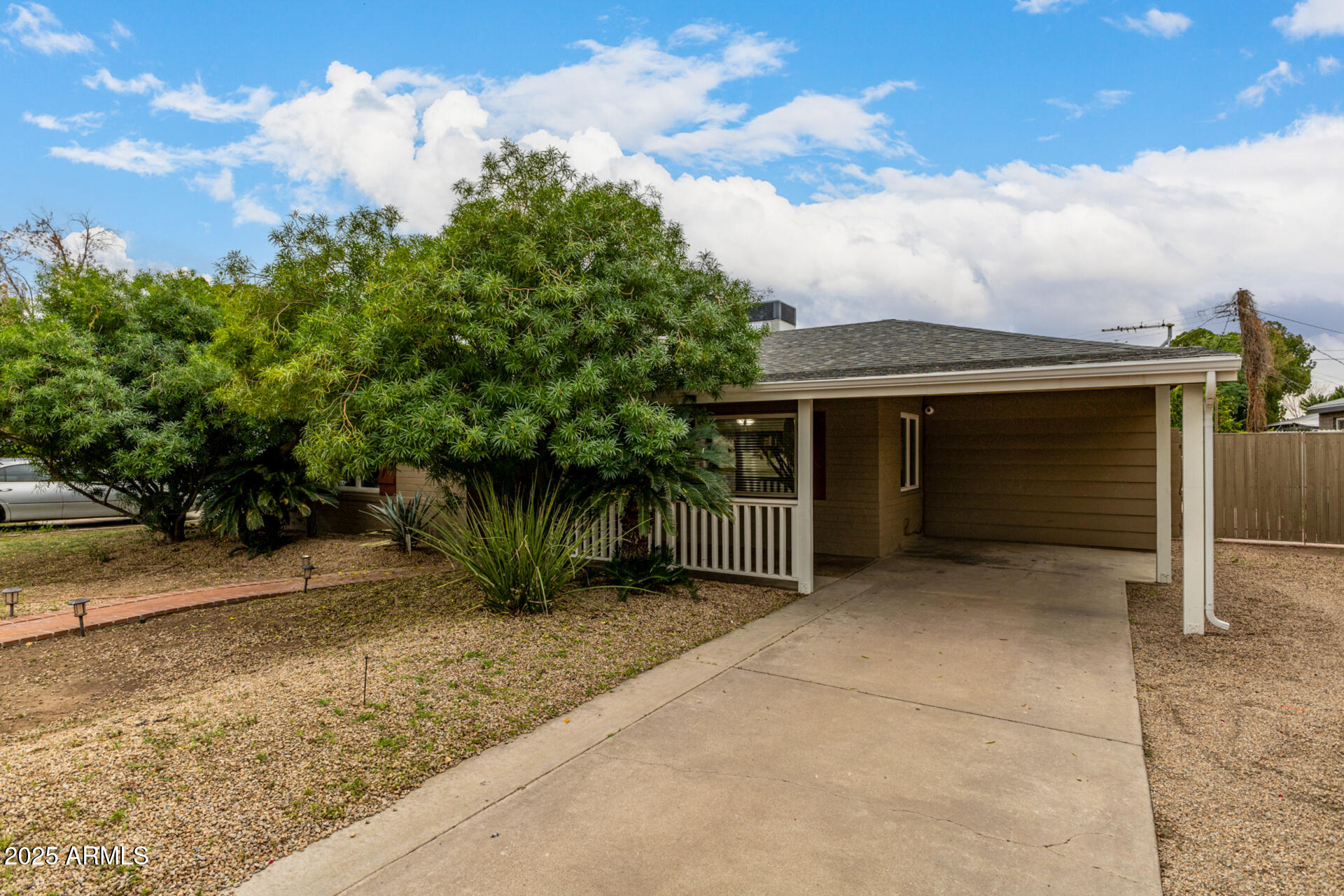 6842 North 10th Place Phoenix, AZ 85014 - Photo 48 of 60 a view of a house with a yard
