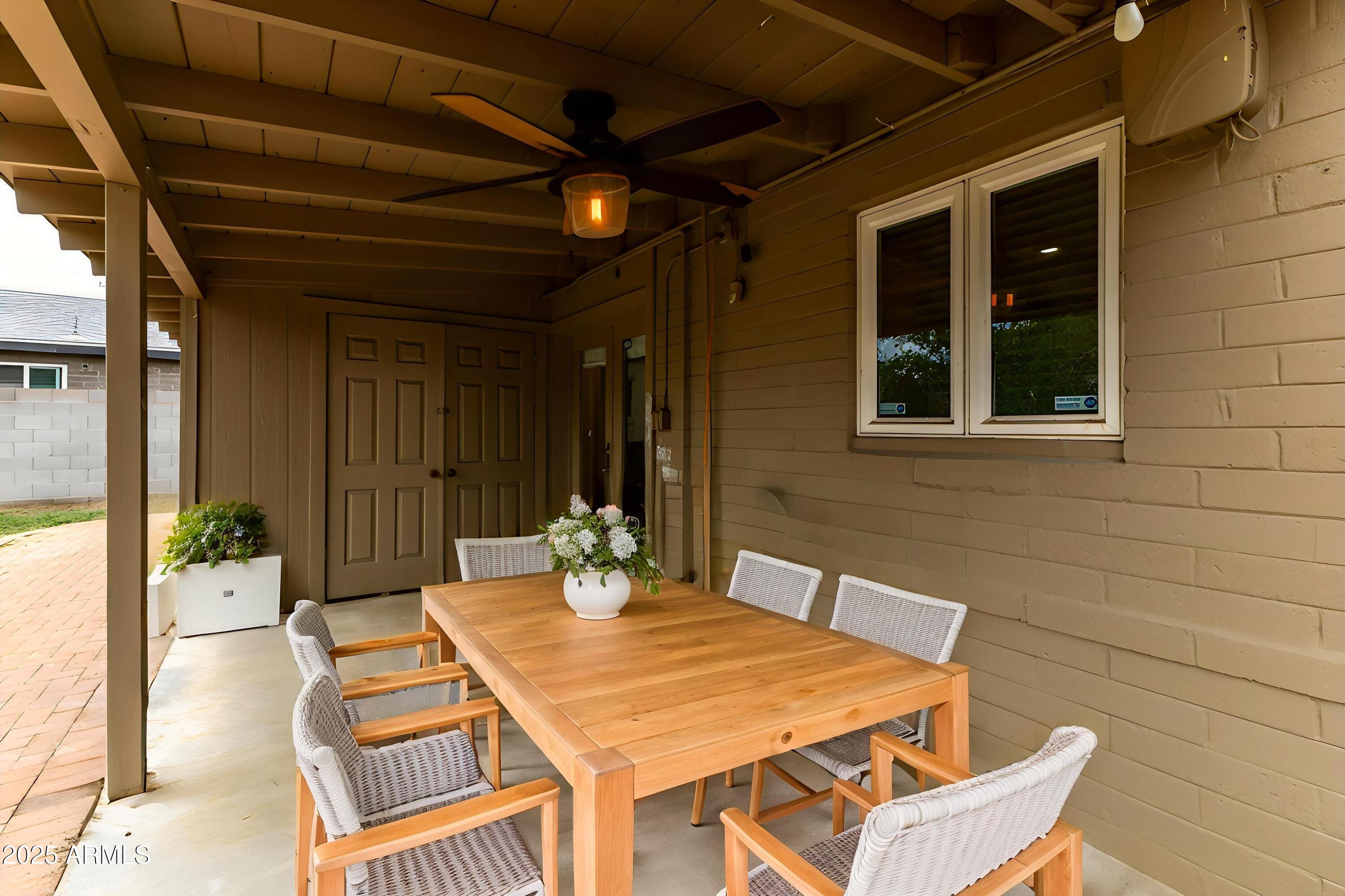 6842 North 10th Place Phoenix, AZ 85014 - Photo 58 of 60 a outdoor space with a table and chairs