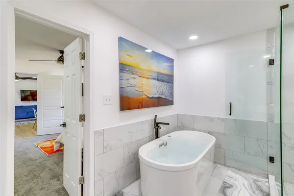 a bathroom with a sink and a tub