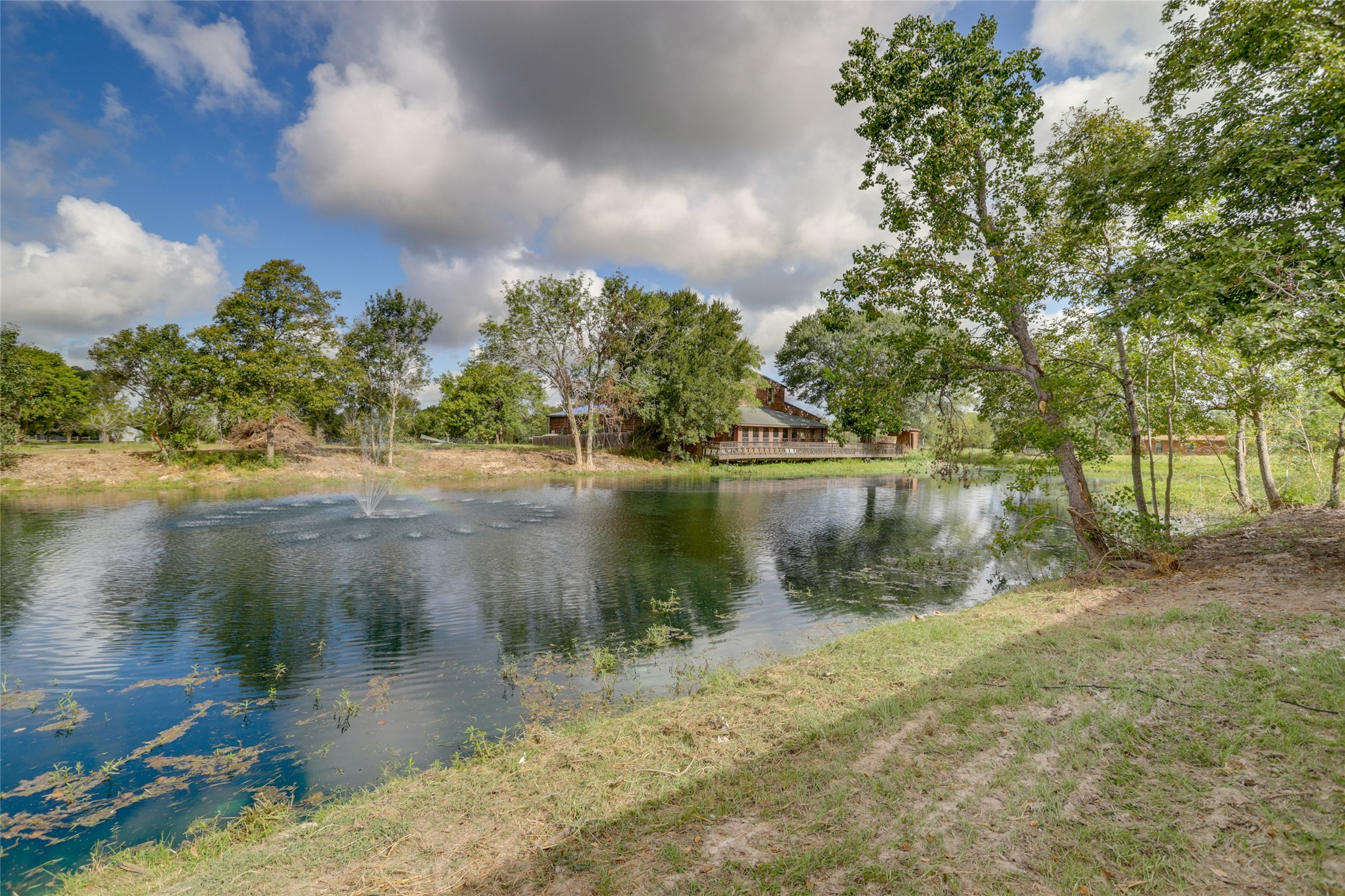 13302 Farm To Market 359, Unit A Hempstead, TX 77445 - Photo 27 of 28 a backyard of a house with lots of green space