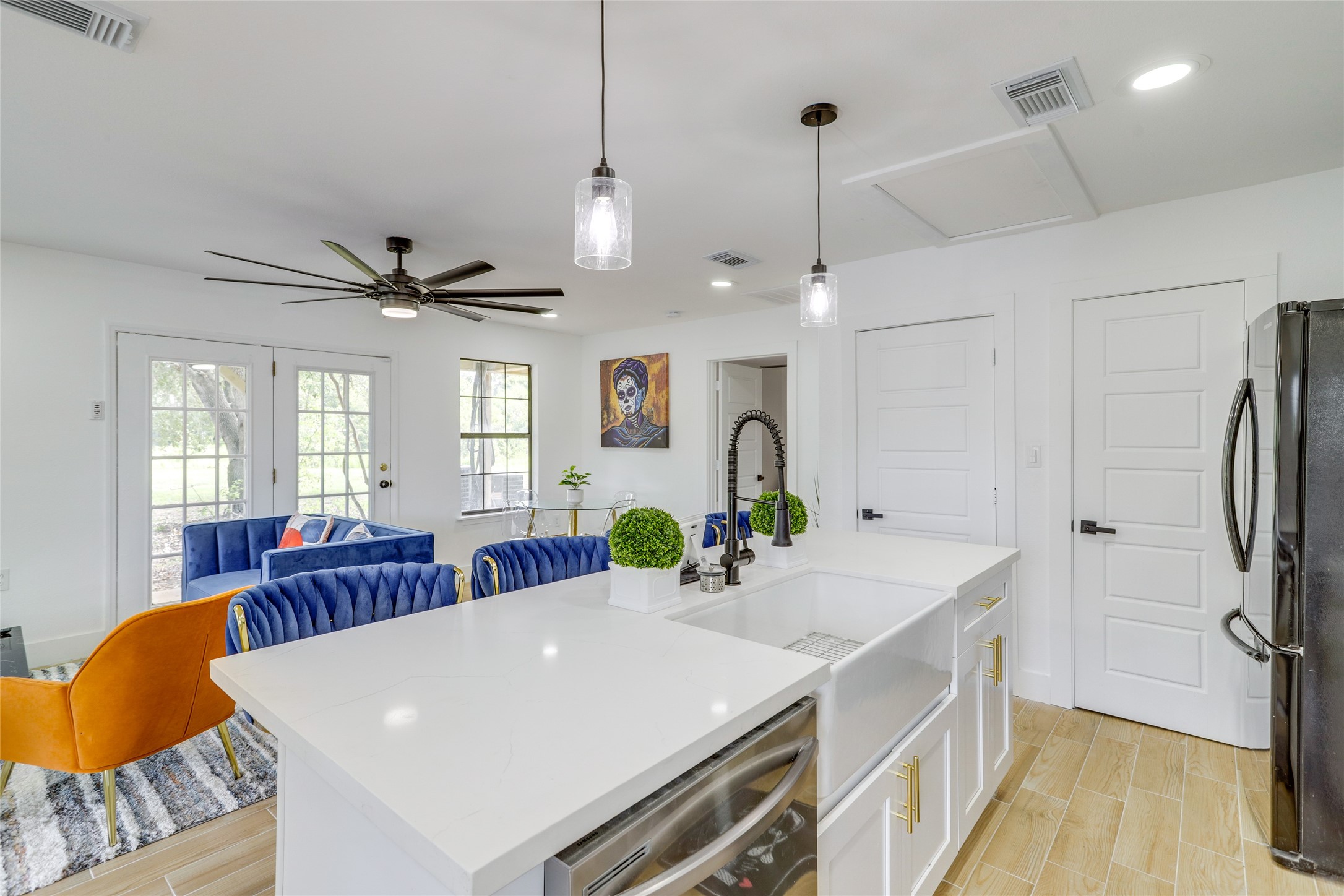 13302 Farm To Market 359, Unit A Hempstead, TX 77445 - Photo 10 of 28 a large white kitchen with a large island