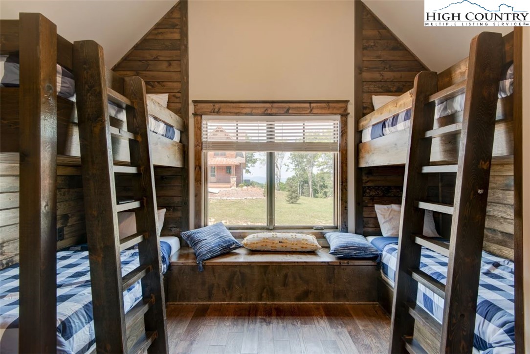 273 High Country Overlook Banner Elk, NC 28604 - Photo 15 of 50 a bed room with a bed and a window