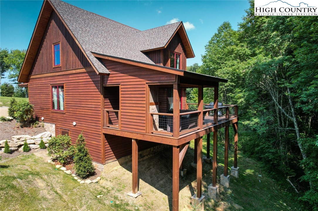 273 High Country Overlook Banner Elk, NC 28604 - Photo 21 of 50 a view of small house with wooden fence