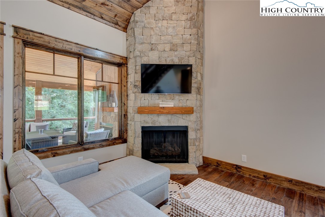 273 High Country Overlook Banner Elk, NC 28604 - Photo 23 of 50 a living room with furniture and a fireplace