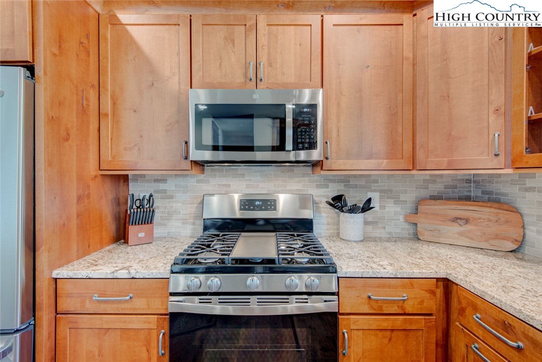 273 High Country Overlook Banner Elk, NC 28604 - Photo 29 of 50 a stove top oven sitting inside of a kitchen